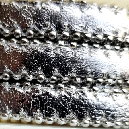 10 mm flat metallic gray leather with silver balls on the sides